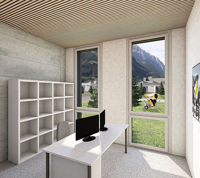 Modern office with desk, monitors and panoramic view of mountains and snow generators outside.