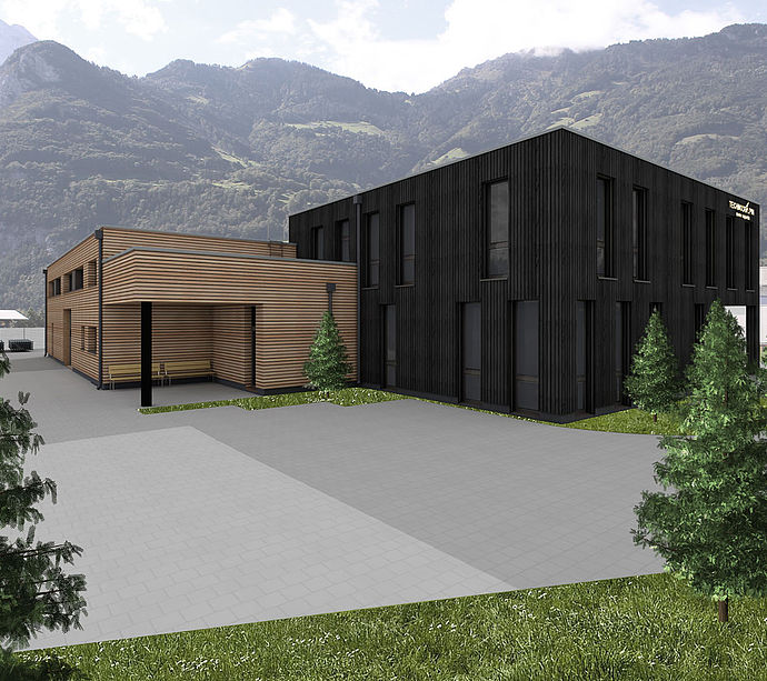 Architectural rendering of planned TechnoAlpin building with dark and light wood cladding.